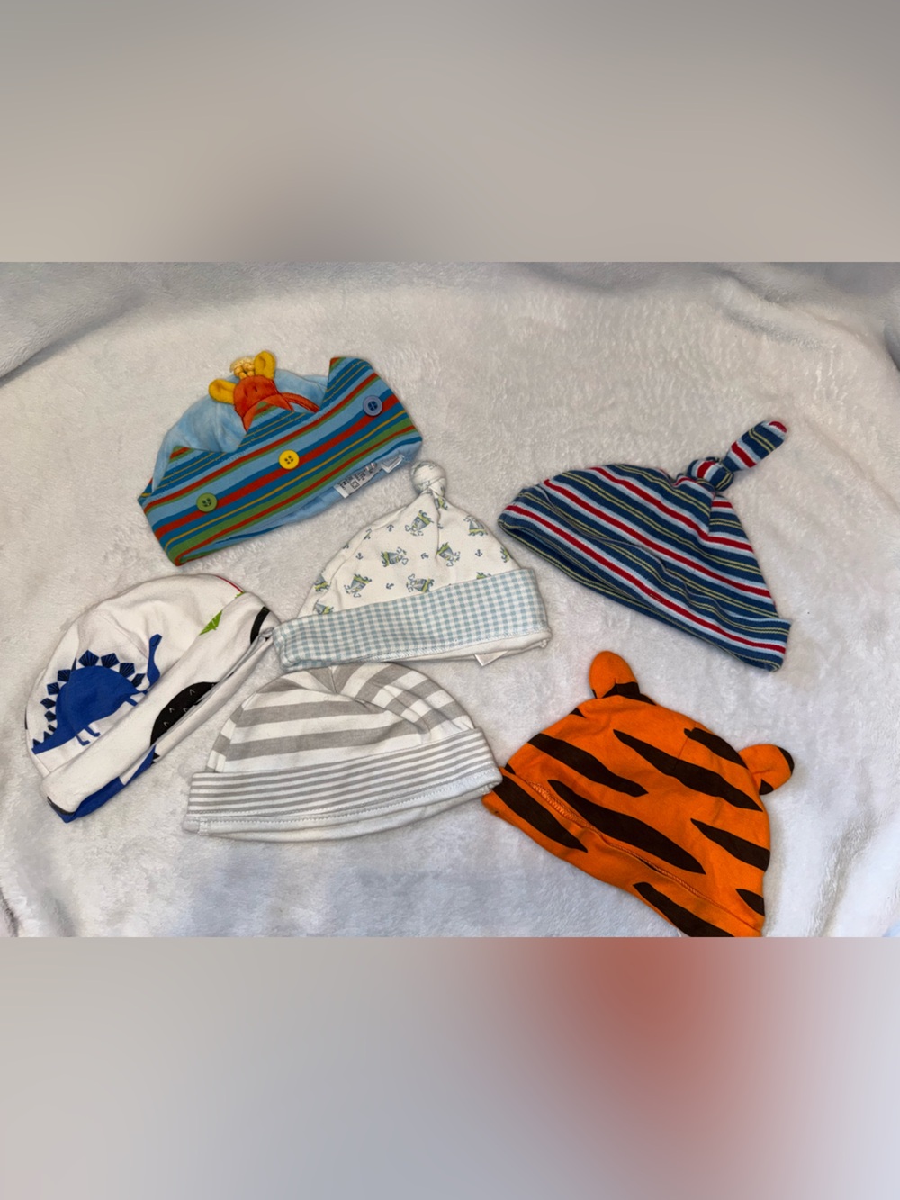 6 assorted baby soft hats. Size 6-12 months.